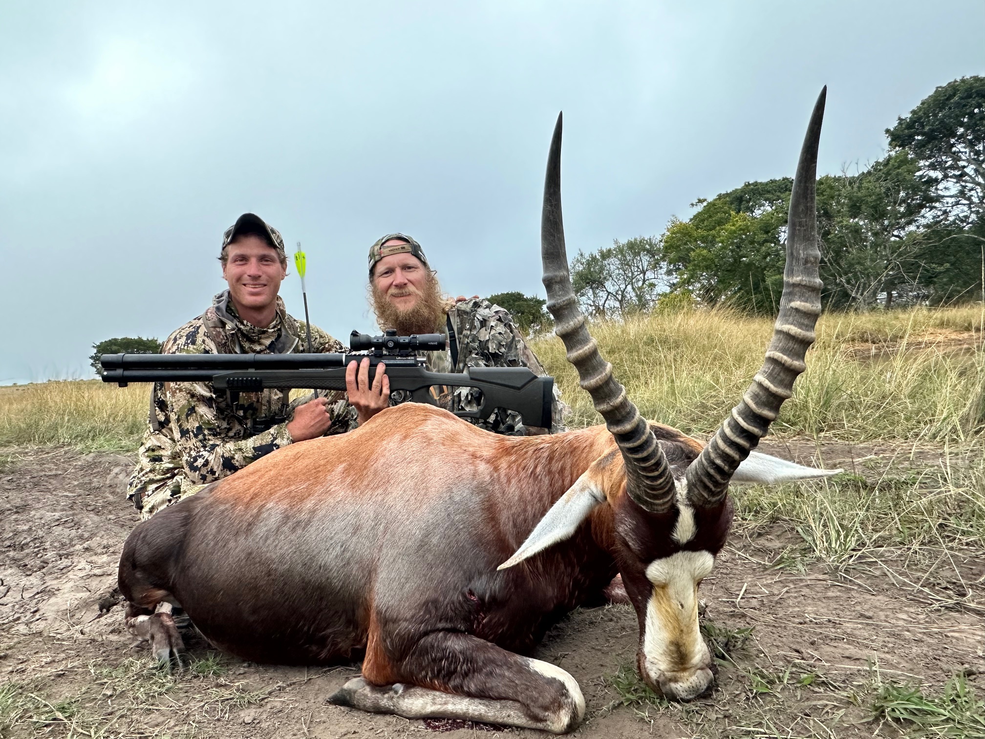 Chris Cook with his guide, a world record blesbok and his Umarex AirSaber